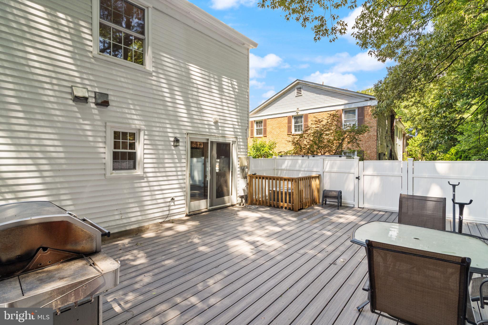 8573 Tyrolean Way Springfield, VA 22153 - Photo 22 of 32 a view of a house with a patio