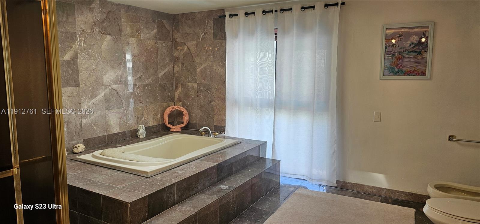 363 Centre Island Golden Beach, FL 33160 - Photo 12 of 31 a bathroom with a sink a toilet and shower