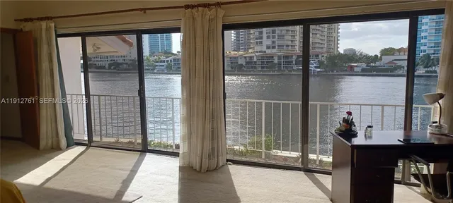 swimming pool view with a outdoor seating space