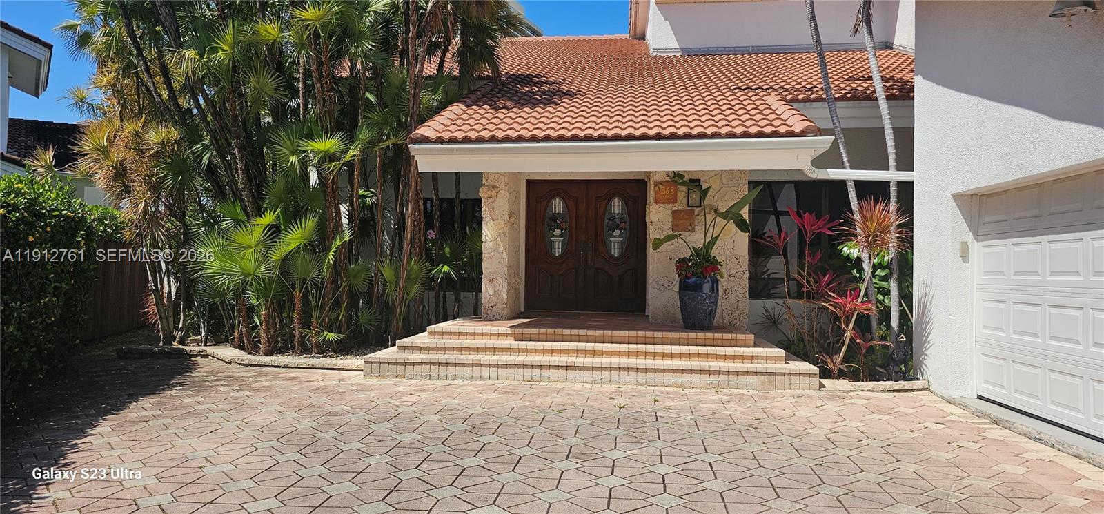 363 Centre Island Golden Beach, FL 33160 - Photo 3 of 31 a view of a entryway door of the house