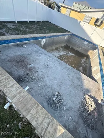 a view of a backyard of the house