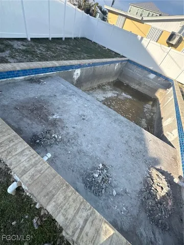 a view of a backyard of the house