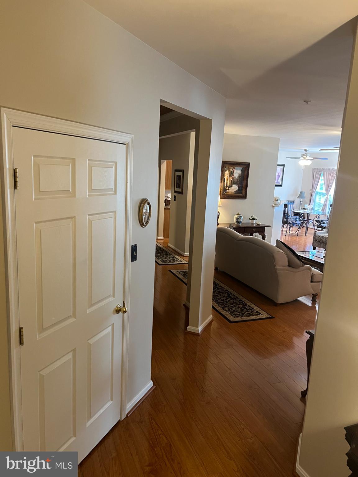 425 Hopkins Landing Drive, Unit 425 Baltimore, MD 21221 - Photo 14 of 43 a bedroom with furniture and a wooden floor