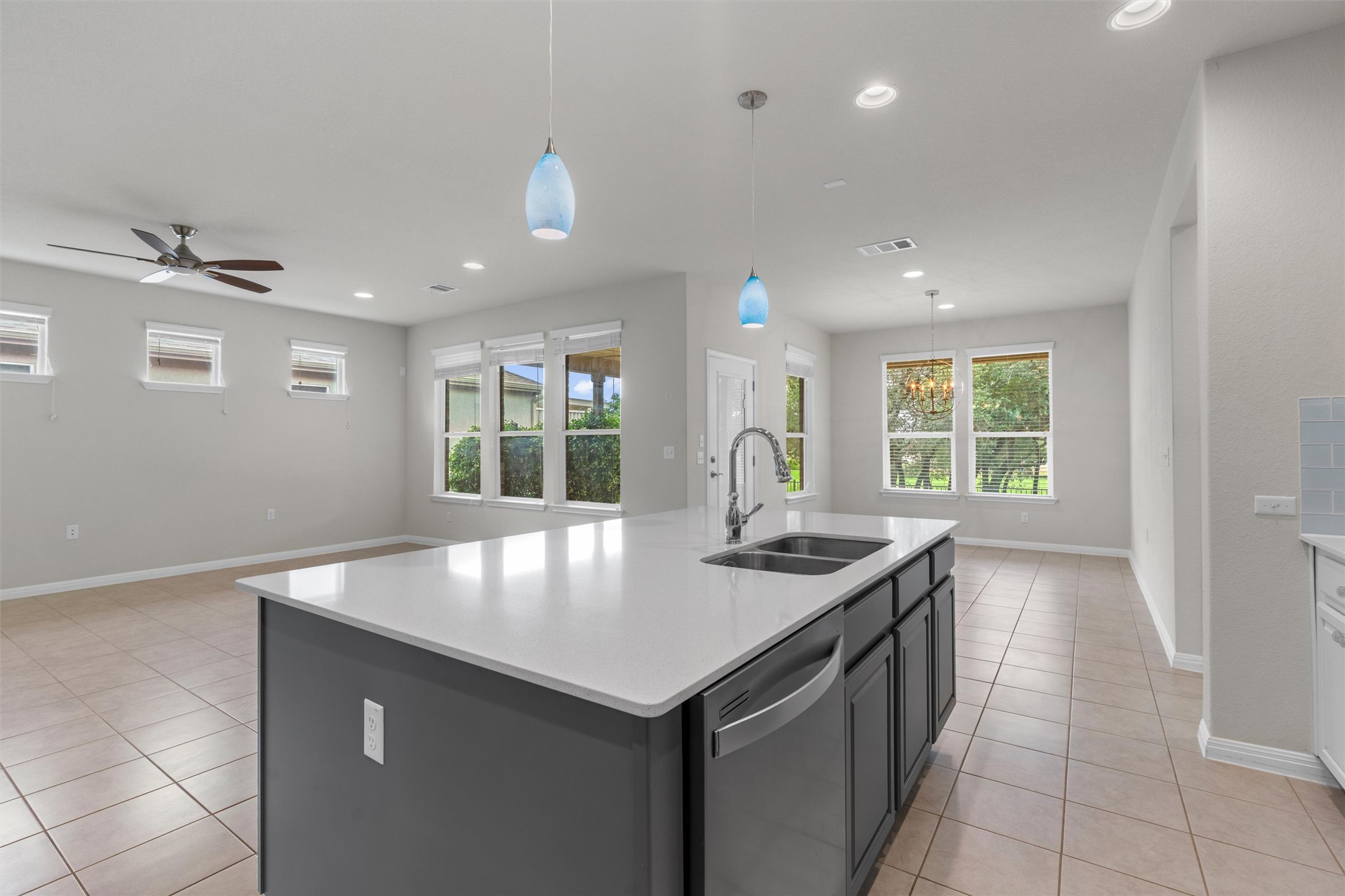 108 Calhoun Lane Georgetown, TX 78633 - Photo 14 of 32 a kitchen with a sink and a window