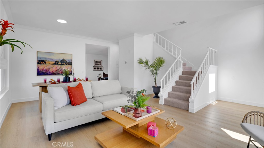 336 Fallingstar Irvine, CA 92614 - Photo 12 of 73 a living room with furniture and wooden floor