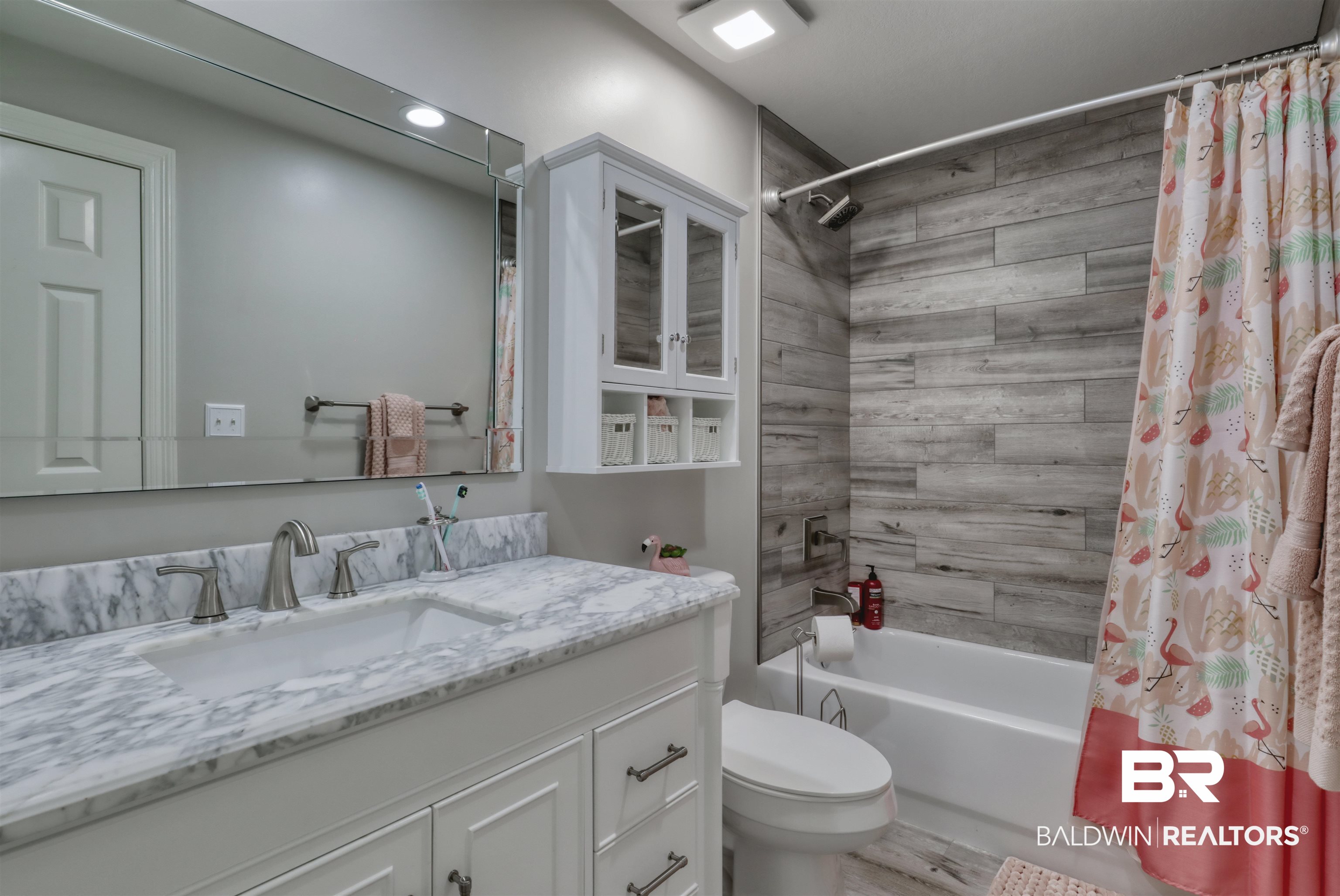 27800 Canal Road, Unit 403 & 404 Orange Beach, AL 36561 - Photo 19 of 39 Full bathroom featuring toilet, vanity, and shower / tub combo - private guest bathroom