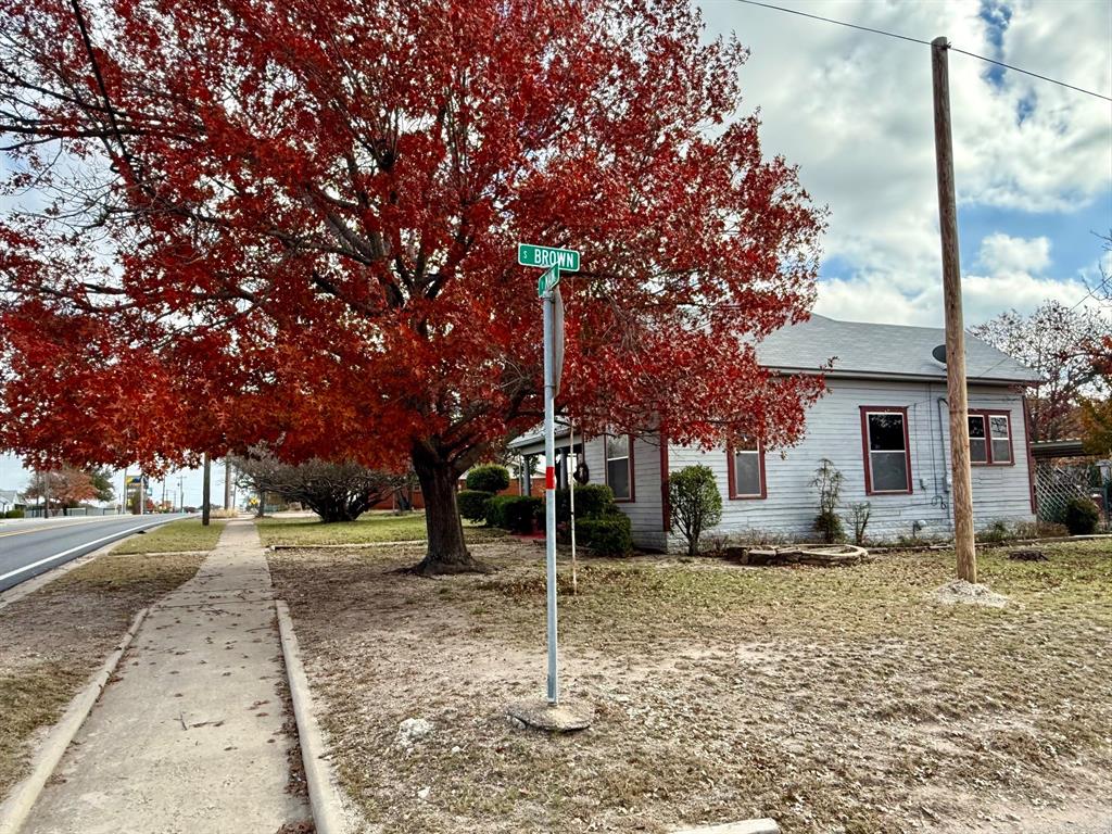 802 East Main Street Hamilton, TX 76531 - Photo 19 of 21 a house with trees in front of it