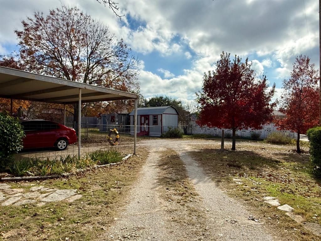 802 East Main Street Hamilton, TX 76531 - Photo 20 of 21 a view of a yard with a tree in the background