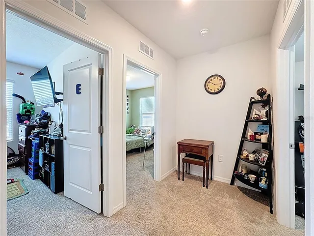 a bedroom with a bed and a walk in closet