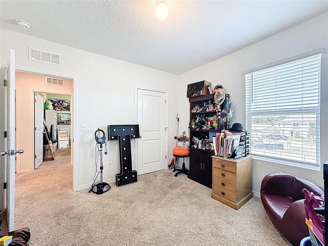 a bathroom with a granite countertop toilet sink and shower