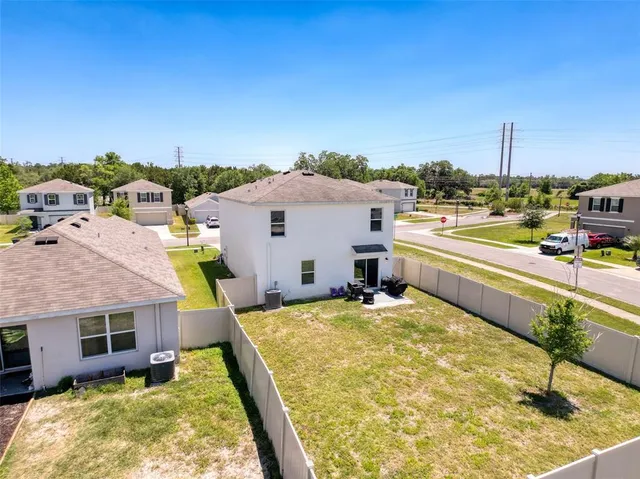 a picture of a bathroom with a refrigerator