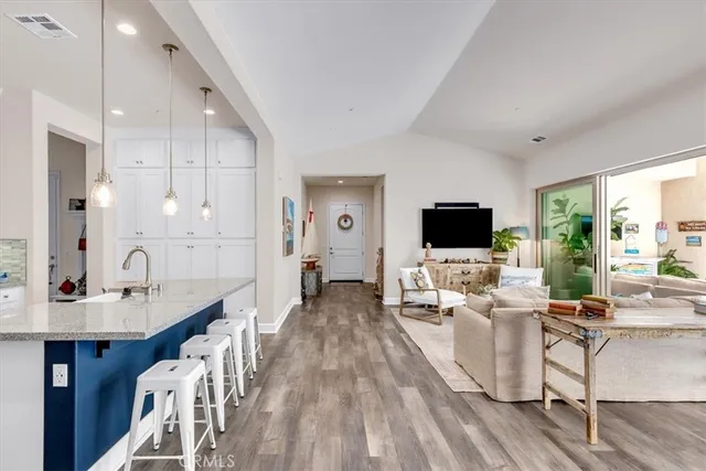 a spacious bedroom with a bed and a table