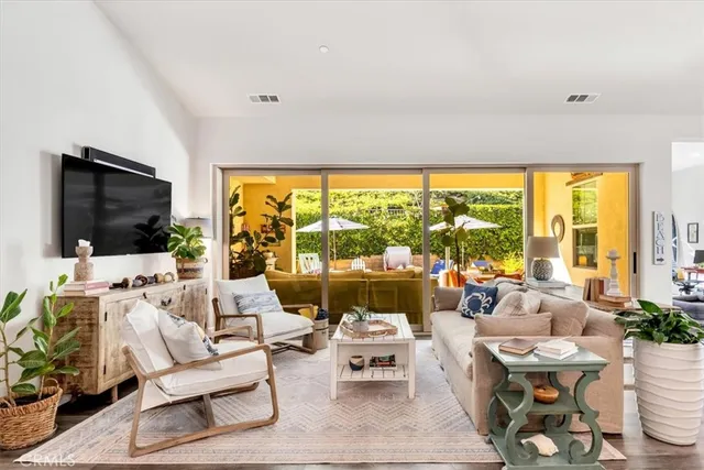 a view of a livingroom with furniture window and outside view