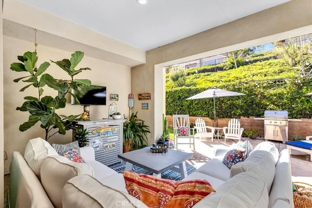 a outdoor living space with furniture and garden view