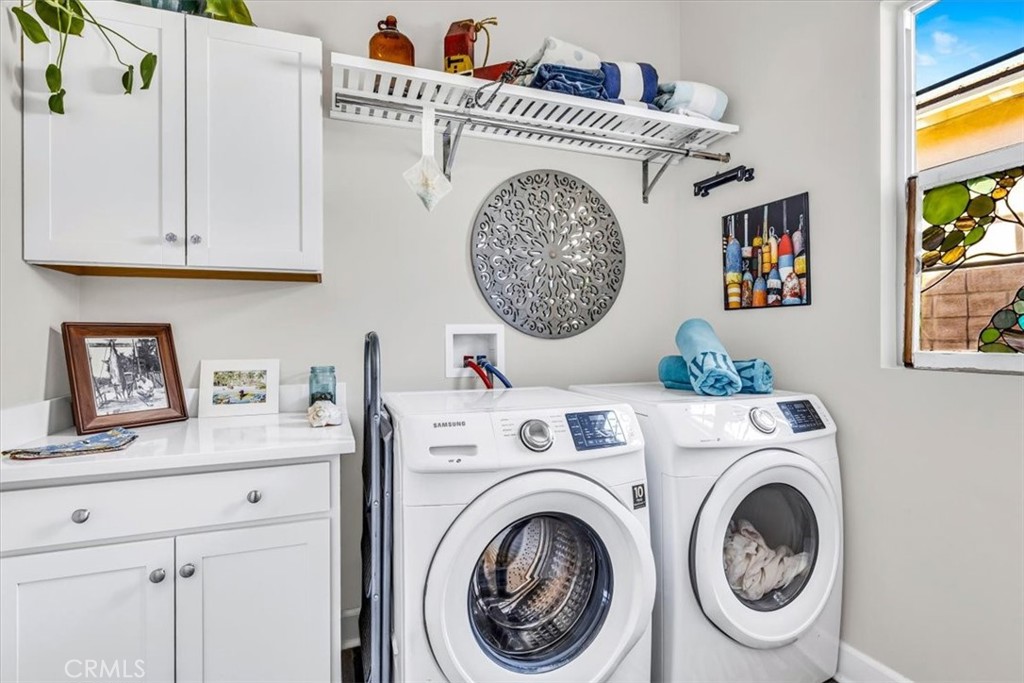 17 Puesto Road Rancho Mission Viejo, CA 92694 - Photo 23 of 69 Dedicated indoor laundry room with plenty of storage for cleaning supplies.