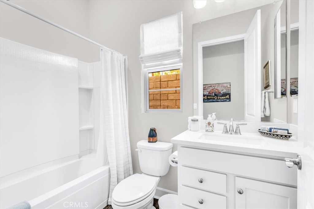 17 Puesto Road Rancho Mission Viejo, CA 92694 - Photo 27 of 69 Secondary bath features, white shaker cabinets, shower/tub.