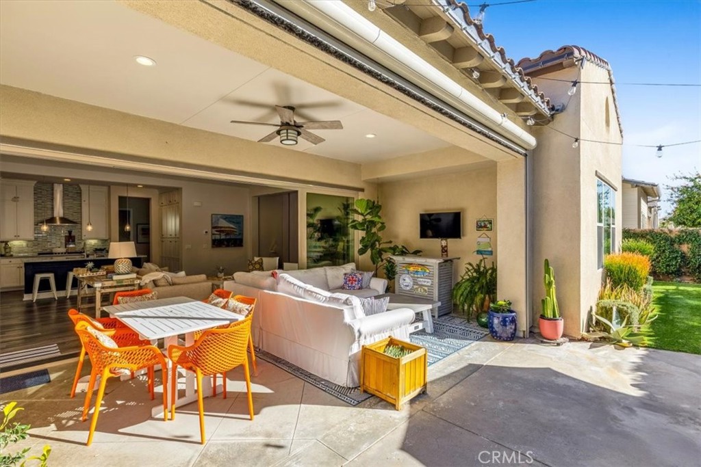 17 Puesto Road Rancho Mission Viejo, CA 92694 - Photo 29 of 69 Open the sliding doors that span the whole back of the living room to create the perfect entertaining area.