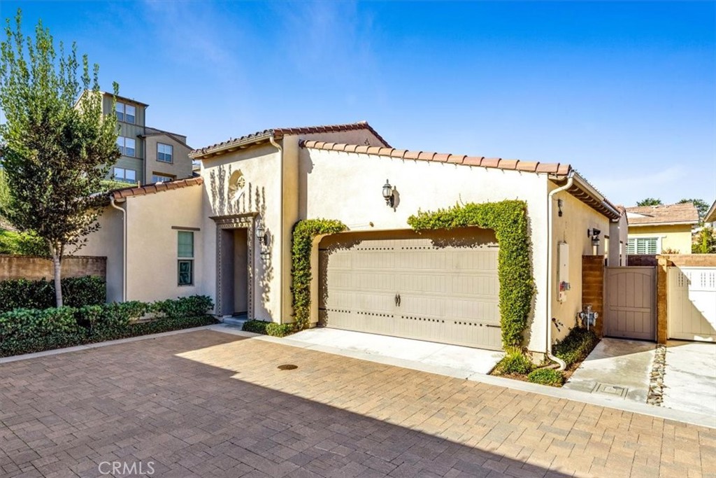 17 Puesto Road Rancho Mission Viejo, CA 92694 - Photo 40 of 69 a front view of a house with a yard
