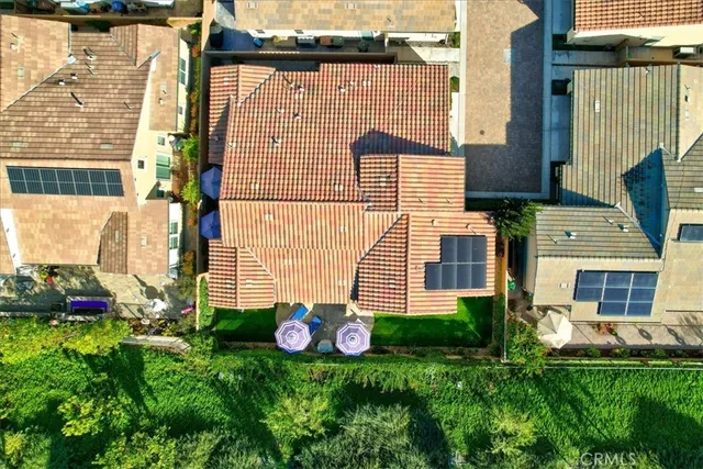 a front view of house with outdoor space and garden