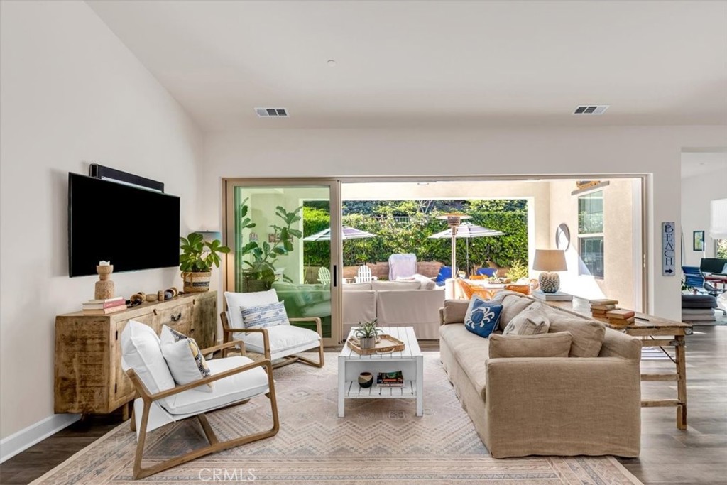 17 Puesto Road Rancho Mission Viejo, CA 92694 - Photo 6 of 69 a living room with furniture and a flat screen tv