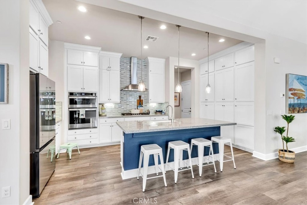 17 Puesto Road Rancho Mission Viejo, CA 92694 - Photo 9 of 69 Stainless steel appliances, 5 burner gas range create the perfect place to try new recipes.
