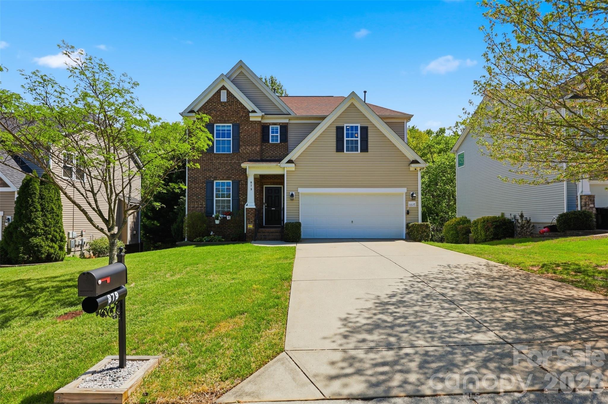 879 Ivy Trail Way Fort Mill, SC 29715 - Photo 1 of 44 a front view of a house with a yard
