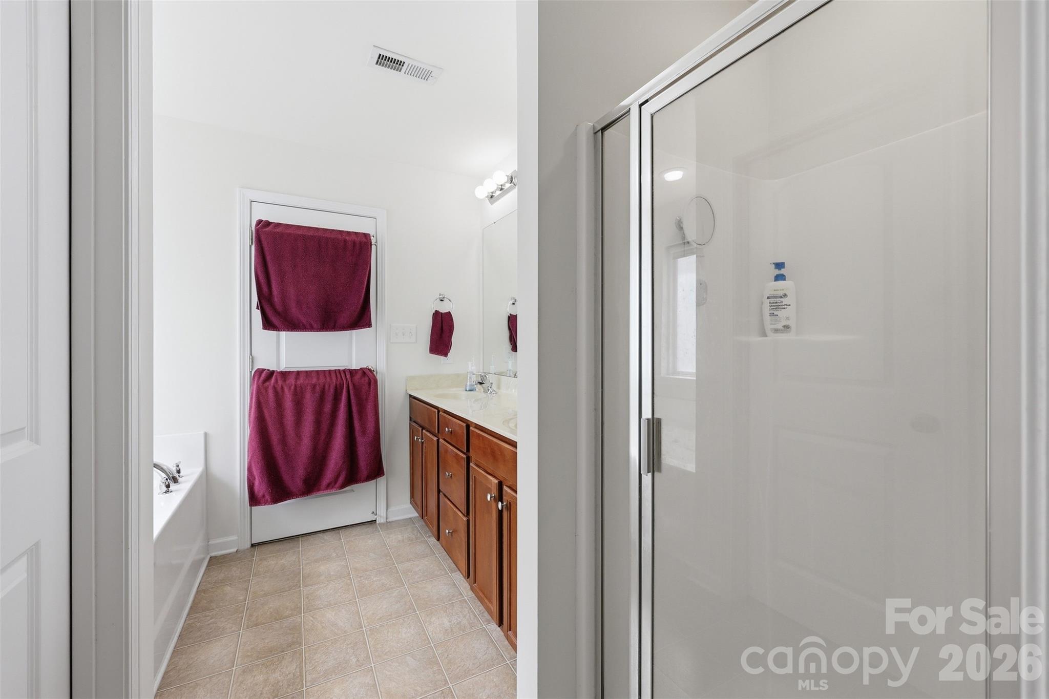 879 Ivy Trail Way Fort Mill, SC 29715 - Photo 14 of 44 a view of bathroom with sink mirror and window