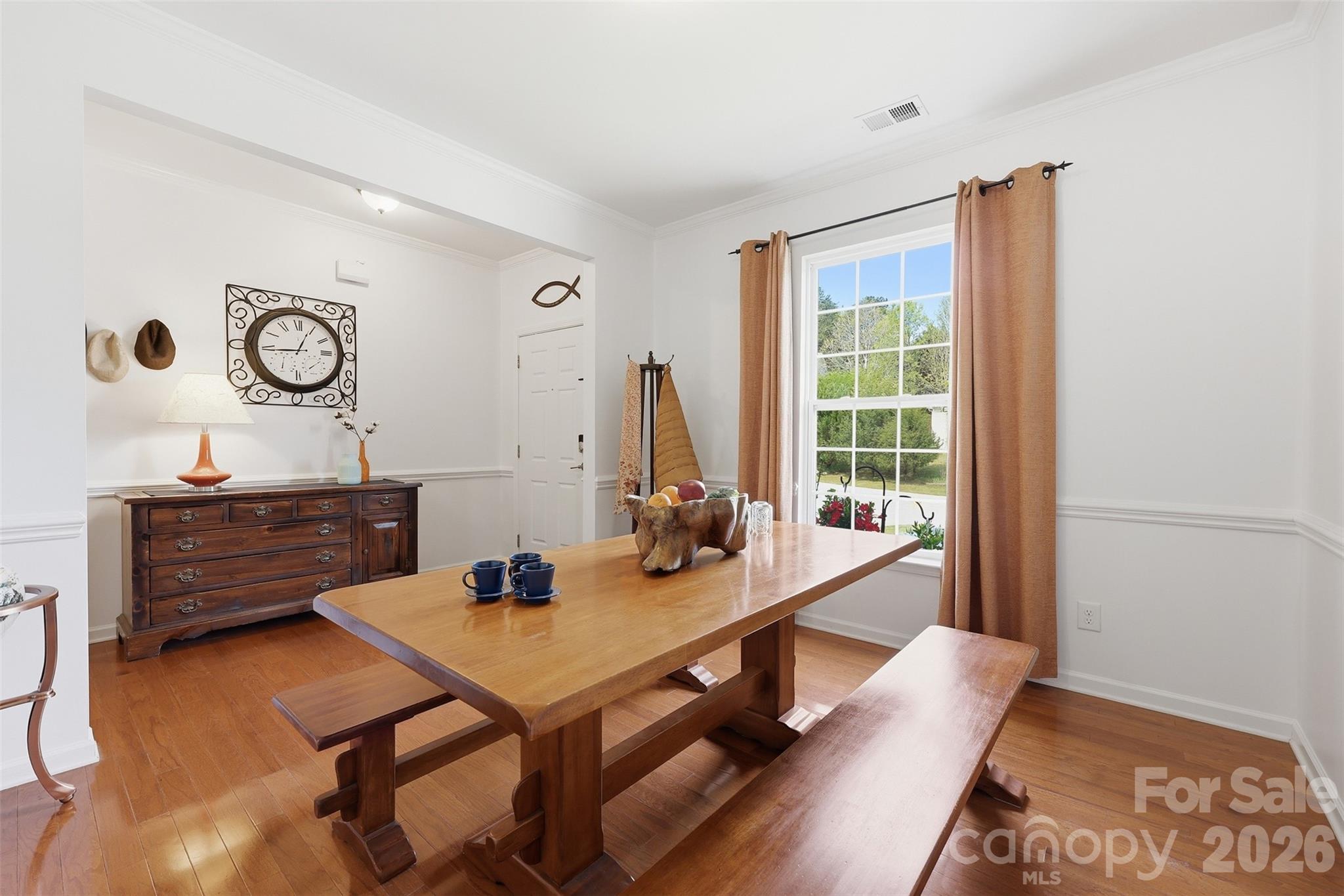 879 Ivy Trail Way Fort Mill, SC 29715 - Photo 4 of 44 a view of a dining room with furniture and window