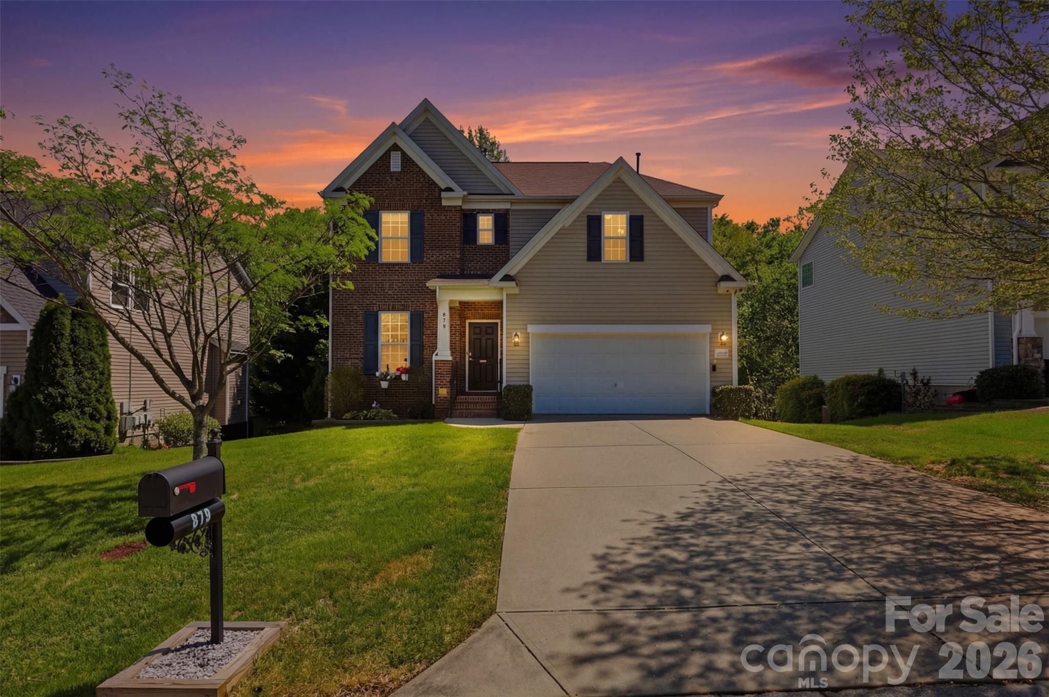 879 Ivy Trail Way Fort Mill, SC 29715 - Photo 43 of 44 a front view of a house with a yard