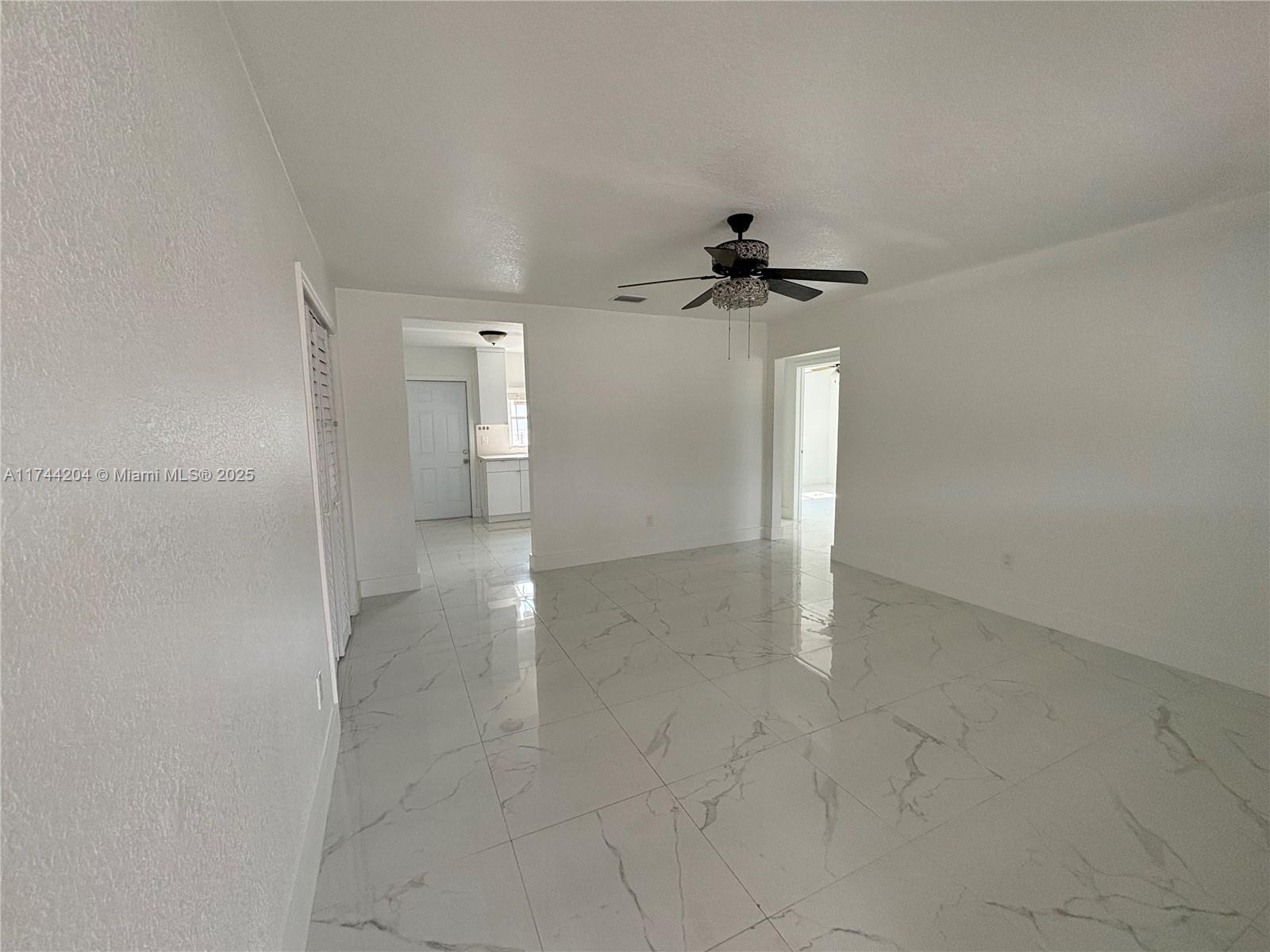 5155 Northwest 12th Avenue Miami, FL 33127 - Photo 7 of 18 wooden floor in an empty room