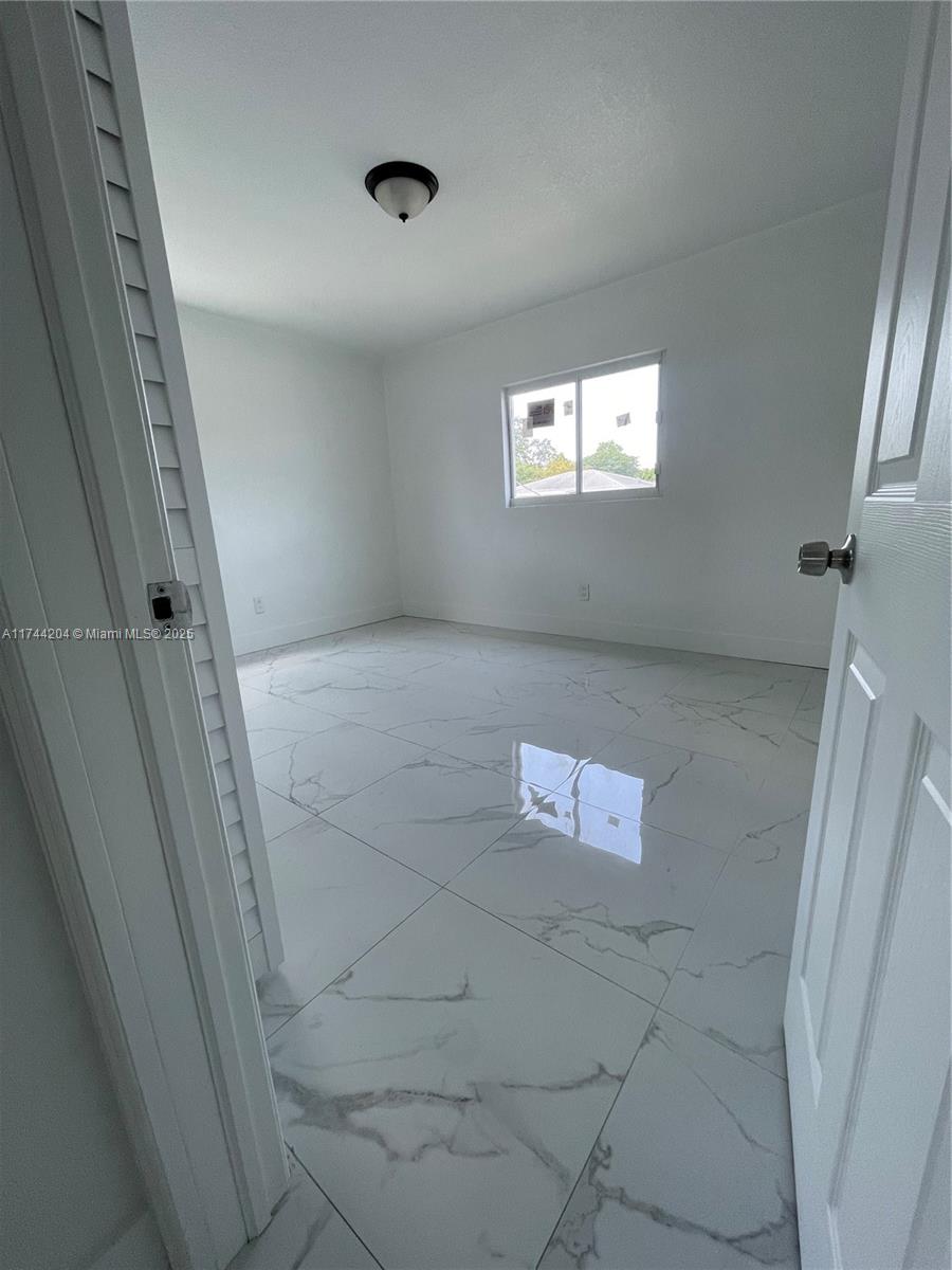 5155 Northwest 12th Avenue Miami, FL 33127 - Photo 8 of 18 a view of a hallway