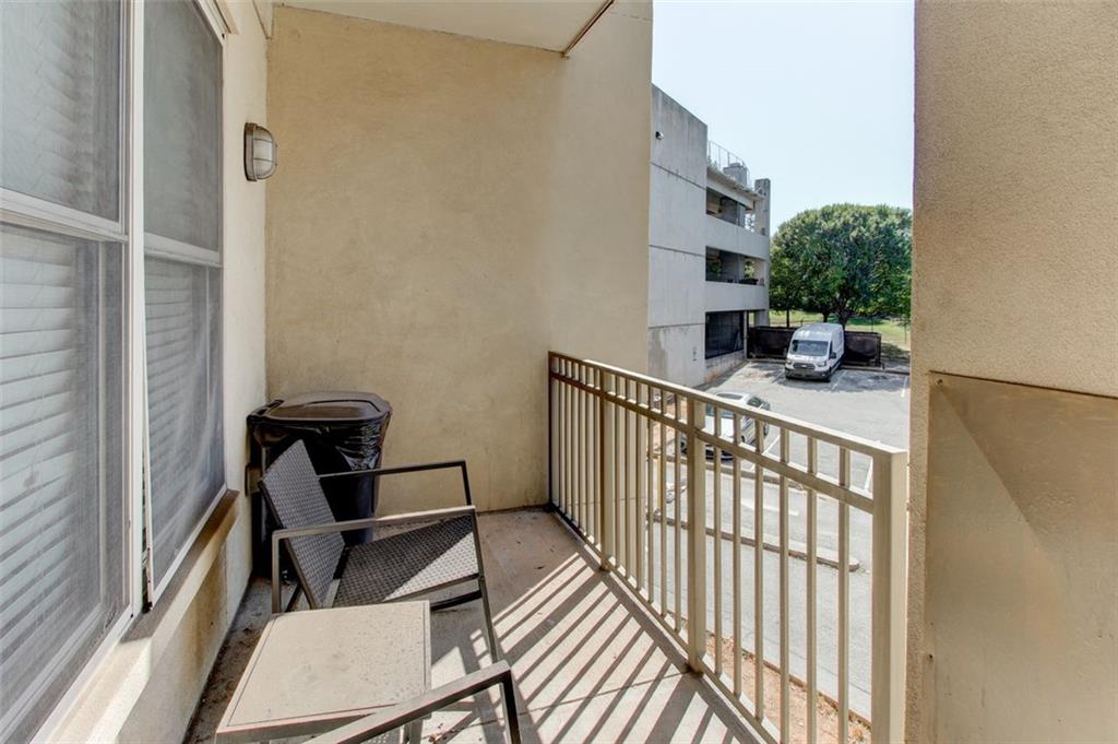 870 Mayson Turner Road Northwest, Unit 1102 Atlanta, GA 30314 - Photo 11 of 27 a view of a balcony with chairs