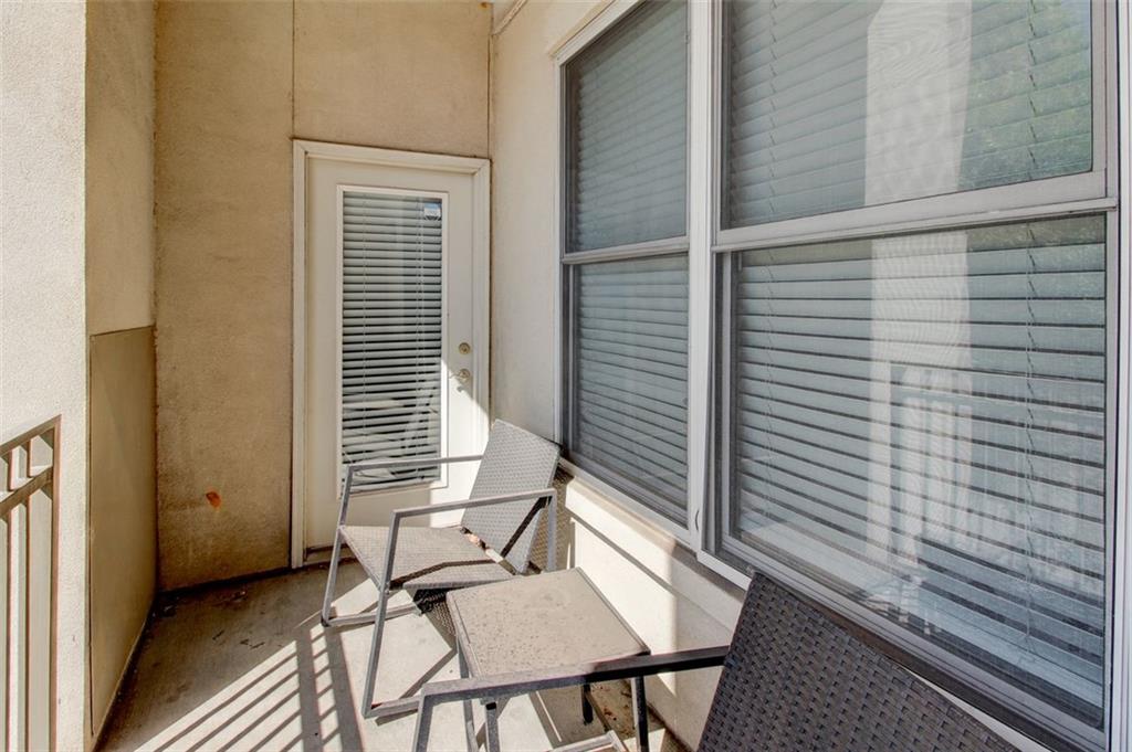 870 Mayson Turner Road Northwest, Unit 1102 Atlanta, GA 30314 - Photo 12 of 27 a view of a balcony with furniture