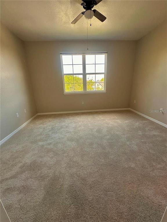 3280 Soho Street, Unit 307 Orlando, FL 32835 - Photo 17 of 34 an empty room with a window