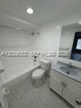 8445 Springtree Drive, Unit 409A Sunrise, FL 33351 - Photo 8 of 9 a close view of sink