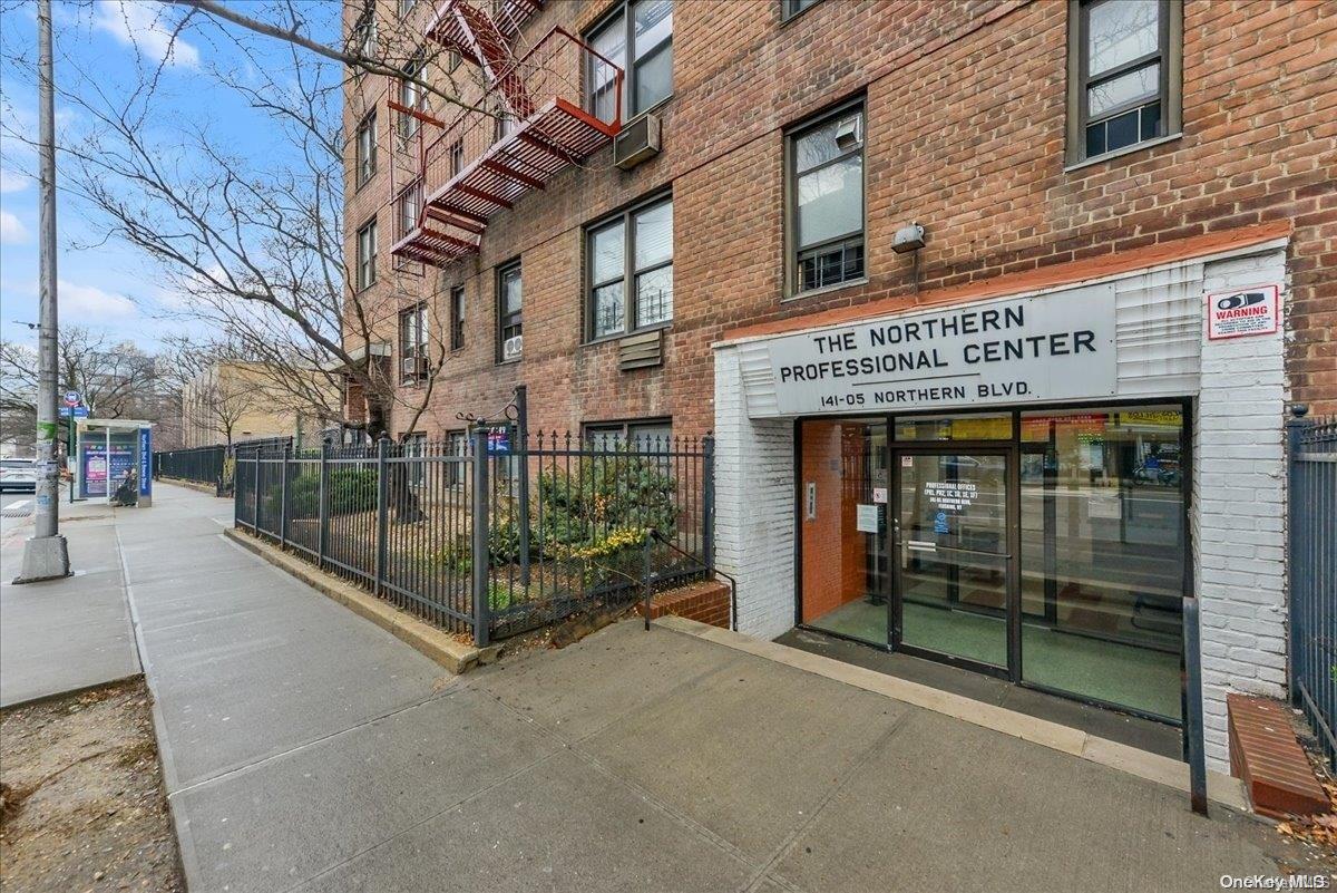 141-05 Northern, Unit C1D1 Queens, NY 11354 - Photo 16 of 17 a view of a building with a tv