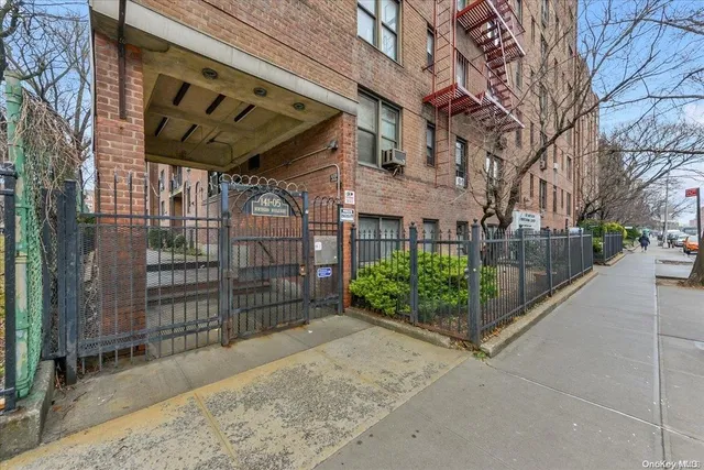 a view of a pathway with a building in the background