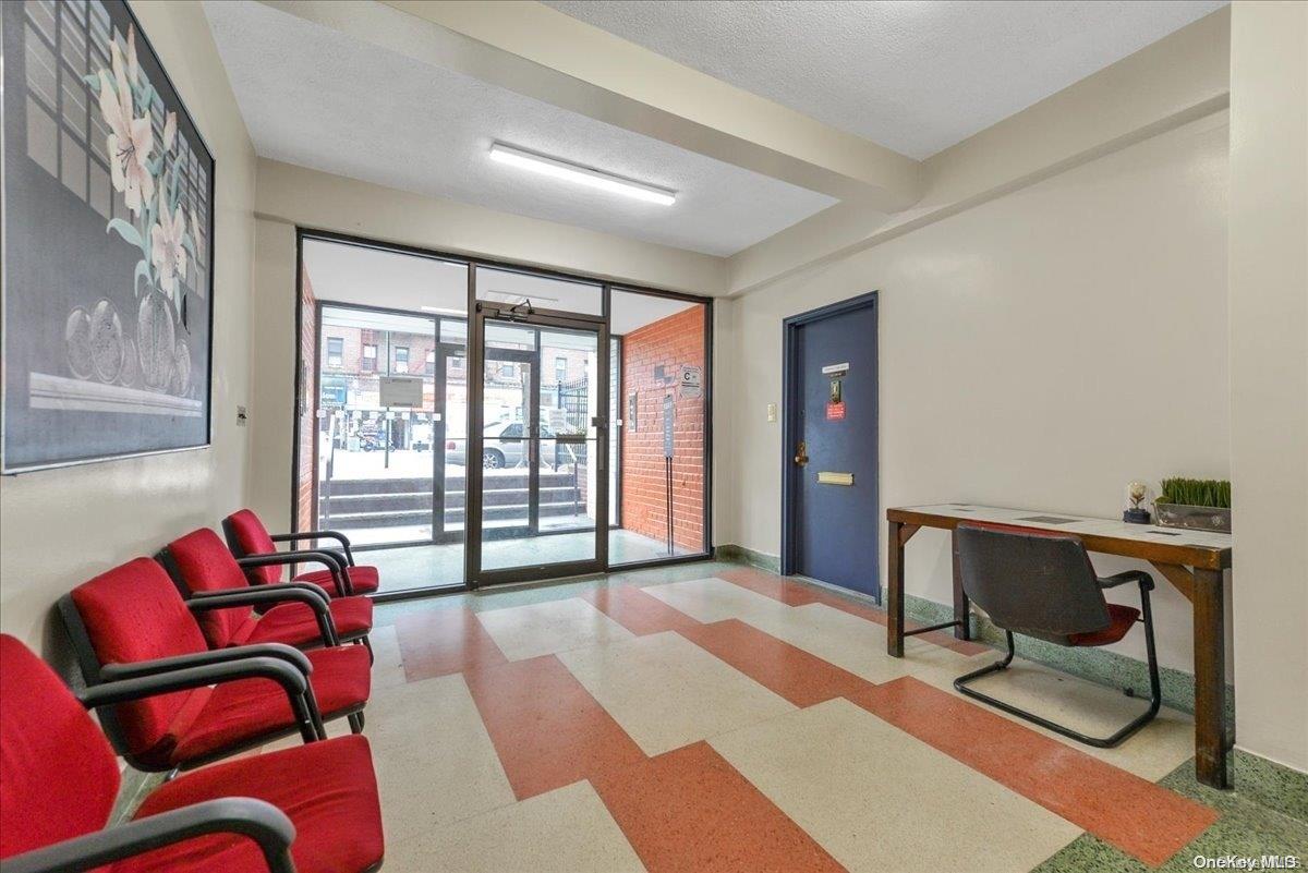 141-05 Northern, Unit C1D1 Queens, NY 11354 - Photo 6 of 17 a bedroom with furniture and a window