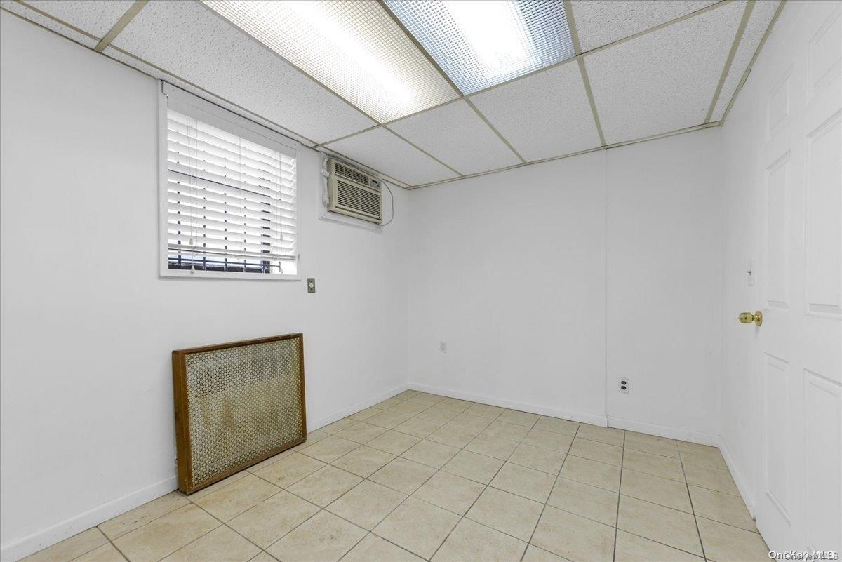 141-05 Northern, Unit C1D1 Queens, NY 11354 - Photo 10 of 17 a view of an empty room with a window