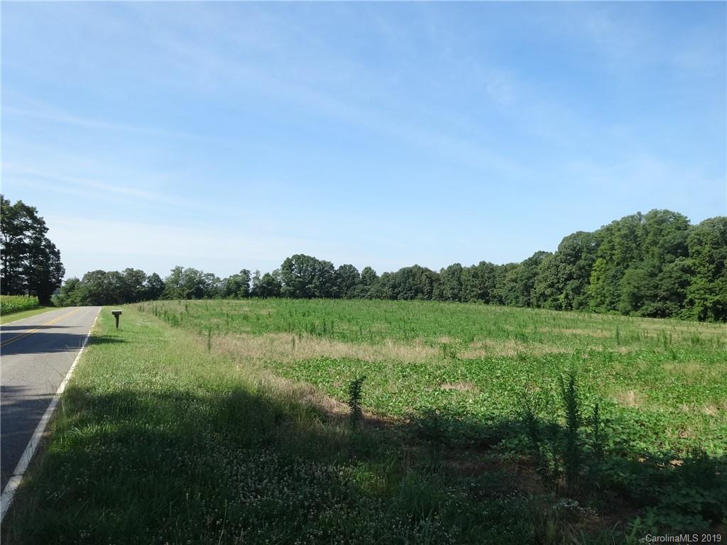 0 Allen Road Harmony, NC 28634 - Photo 3 of 17 a view of a grassy field with trees