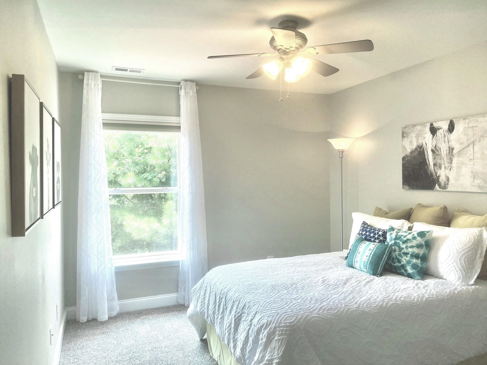 503 Emerald Downs Road Cary, NC 27519 - Photo 13 of 30 Secondary Bedroom with Patio & Pond Views