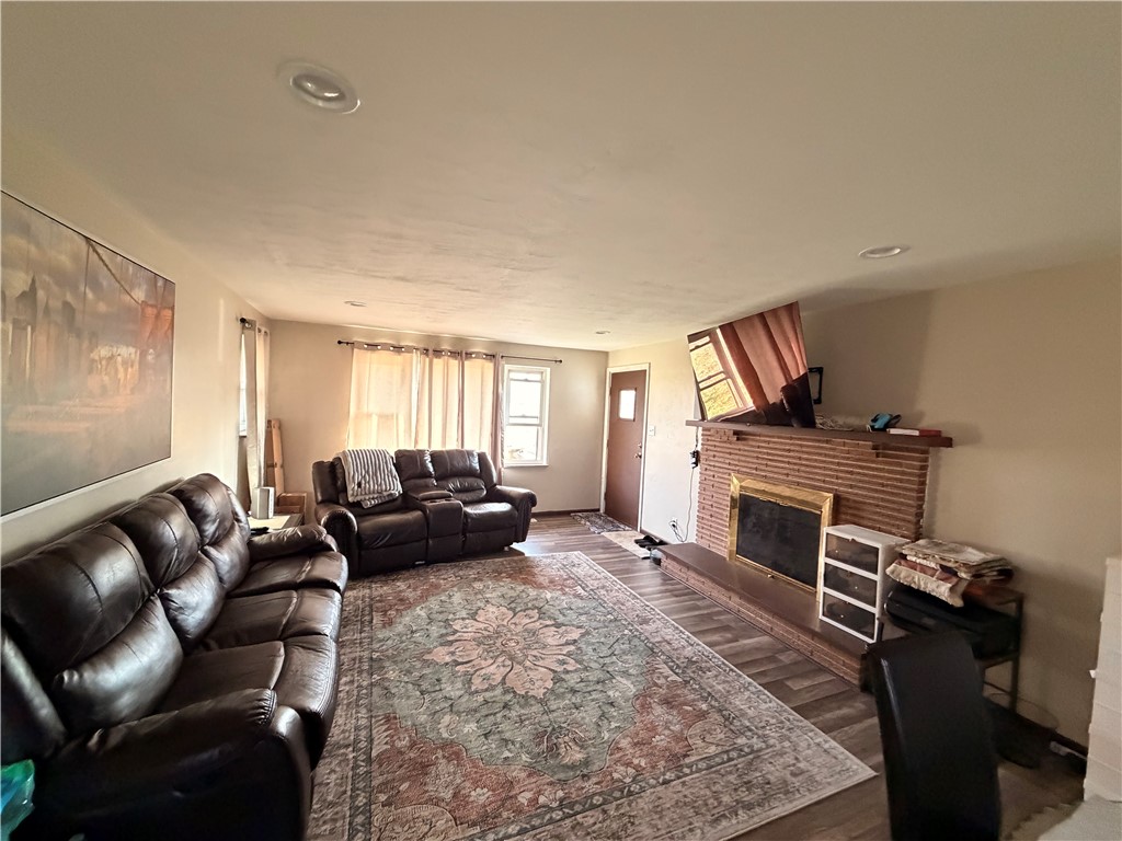 3185 Stop 8 Road Dayton, OH 45414 - Photo 2 of 10 This inviting living space features warm flooring and abundant natural light, perfect for everyday living.