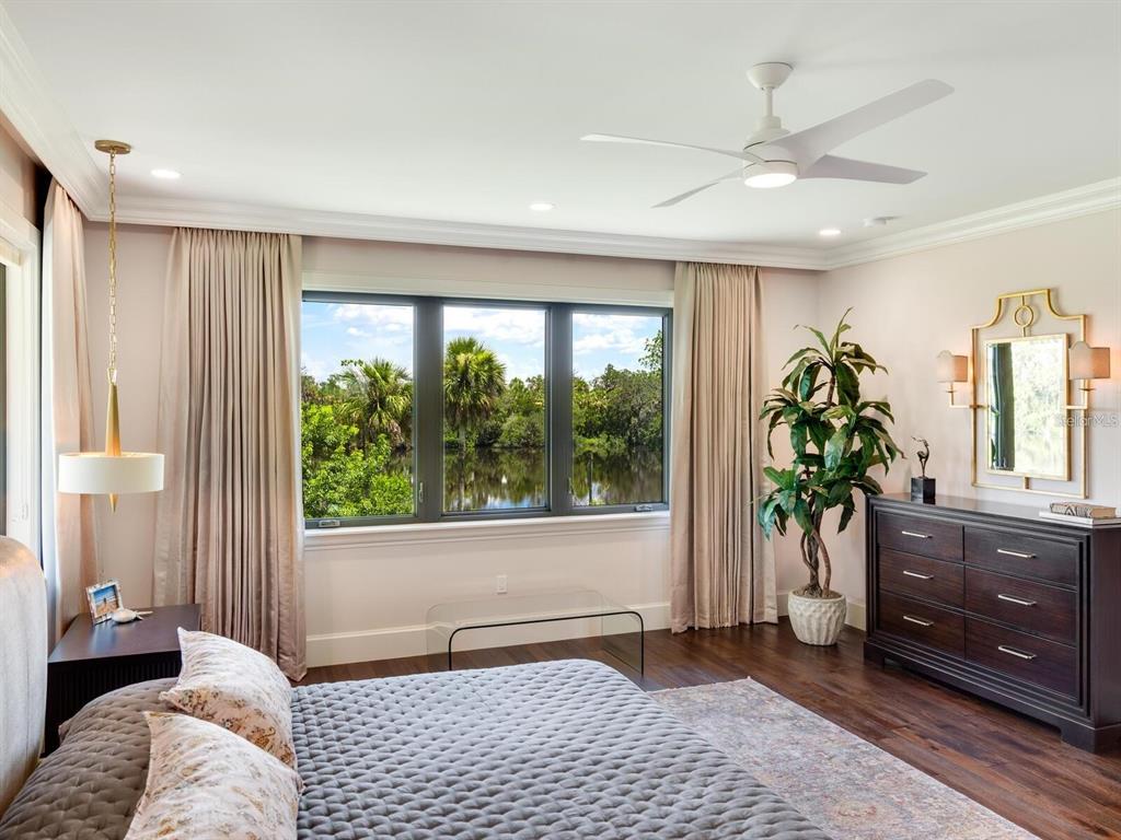 1245 Mill Creek Road Bradenton, FL 34212 - Photo 17 of 56 a bedroom with a bed and a window