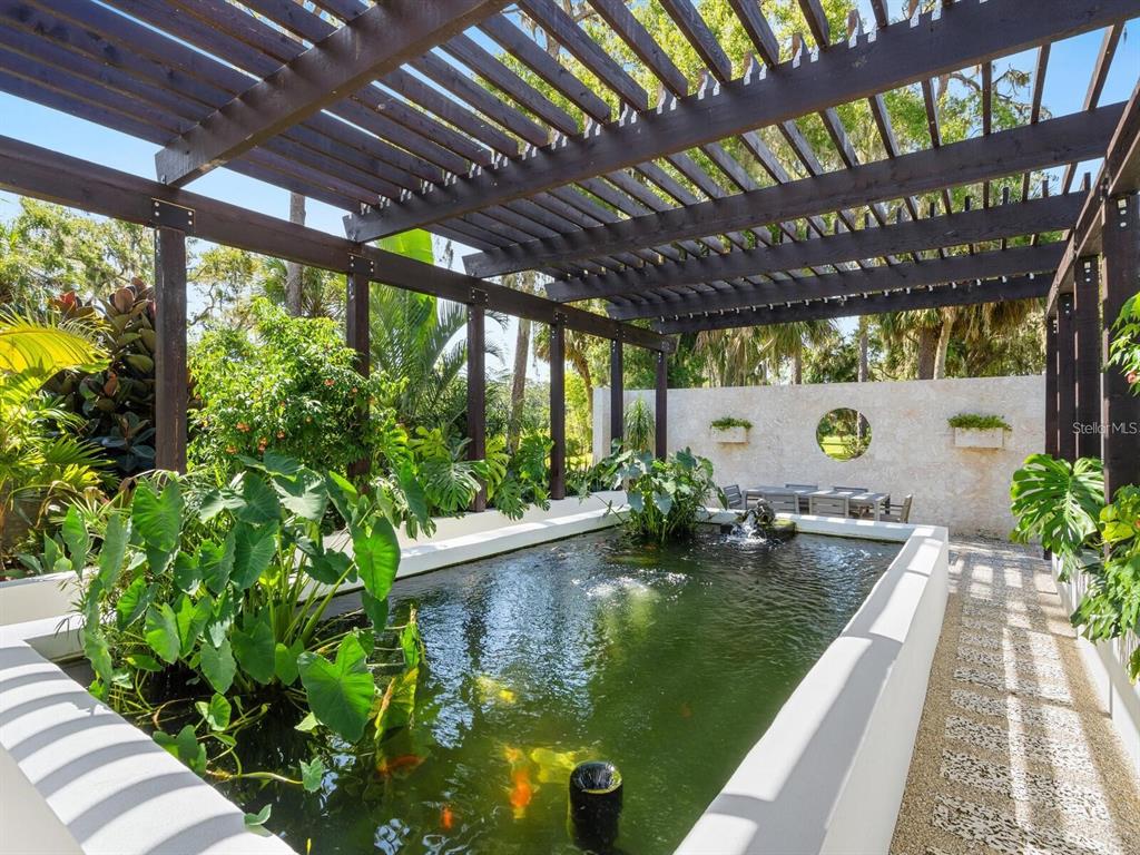 1245 Mill Creek Road Bradenton, FL 34212 - Photo 32 of 56 a view of swimming pool with a patio