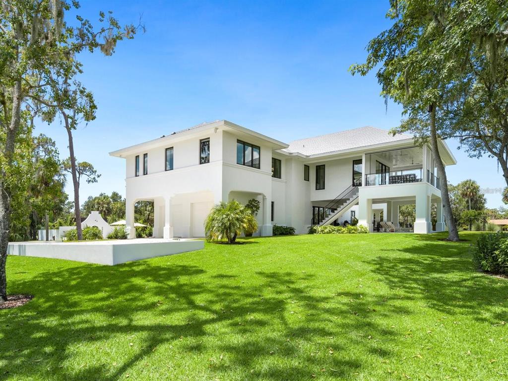 1245 Mill Creek Road Bradenton, FL 34212 - Photo 35 of 56 a front view of a house with a yard