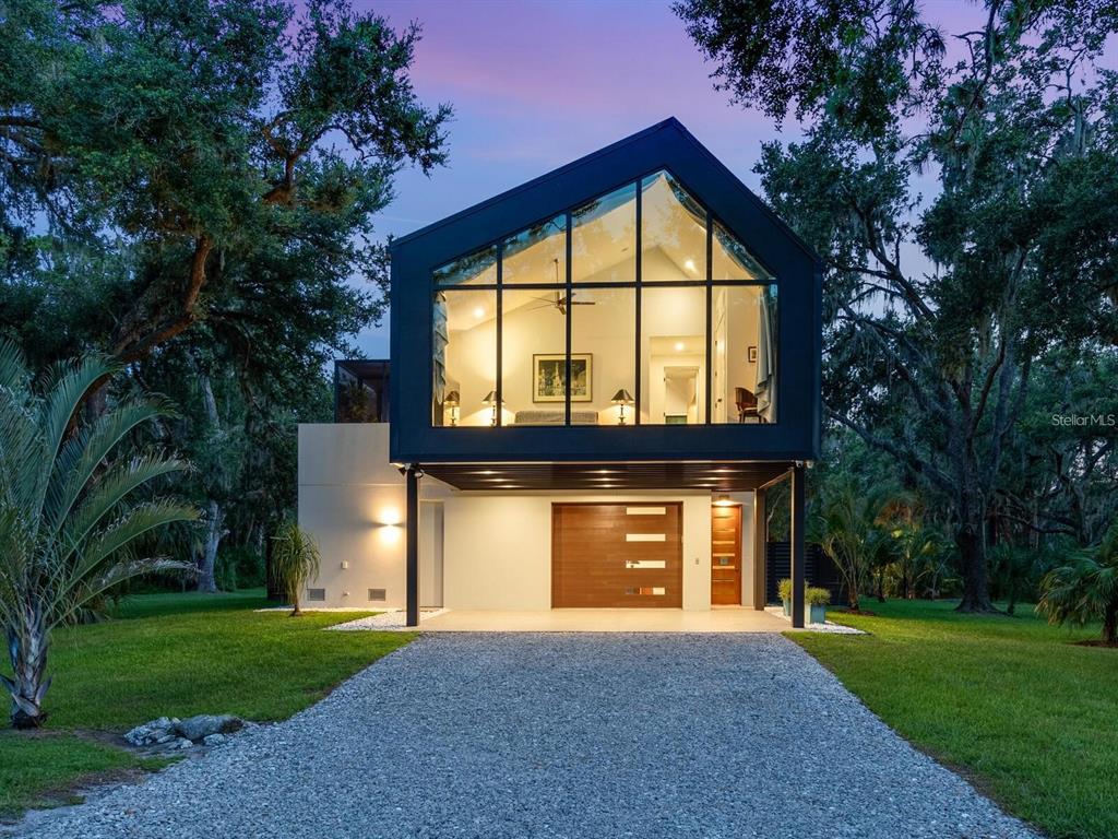 1245 Mill Creek Road Bradenton, FL 34212 - Photo 39 of 56 a front view of a house with a yard