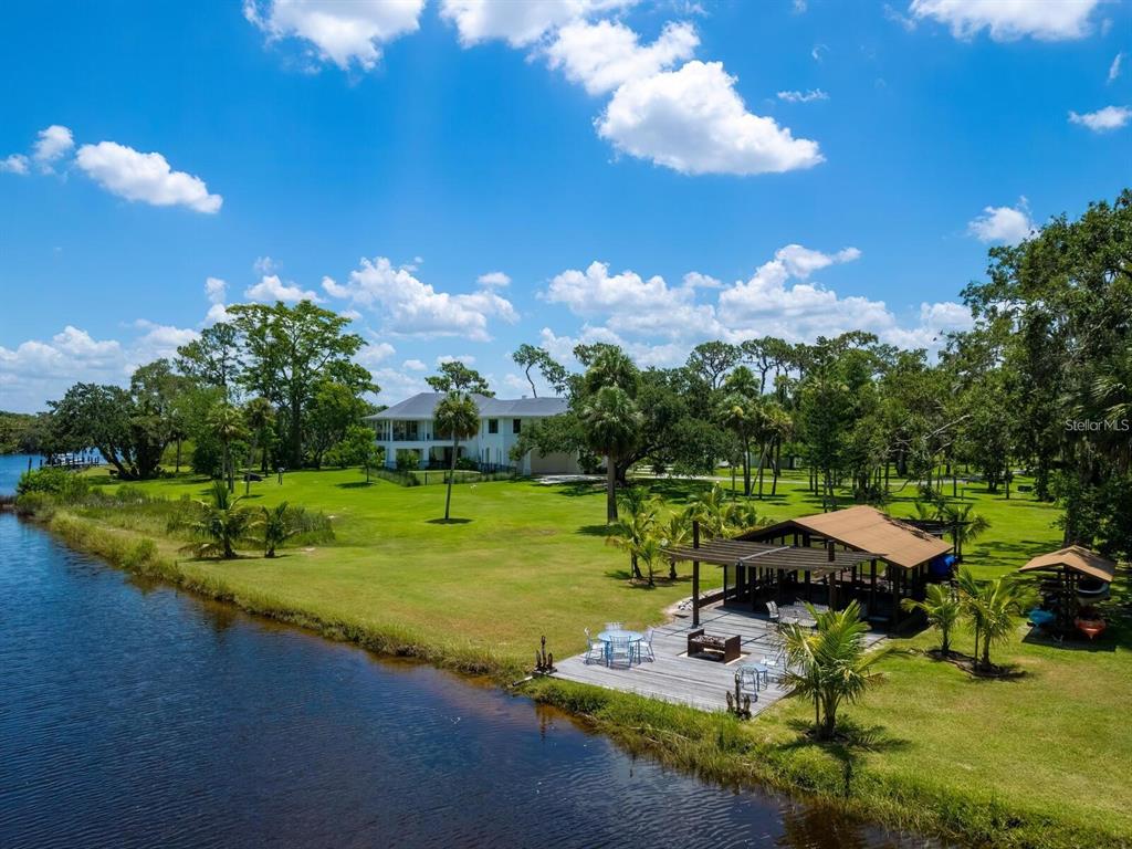 1245 Mill Creek Road Bradenton, FL 34212 - Photo 47 of 56 a view of a garden with an outdoor space