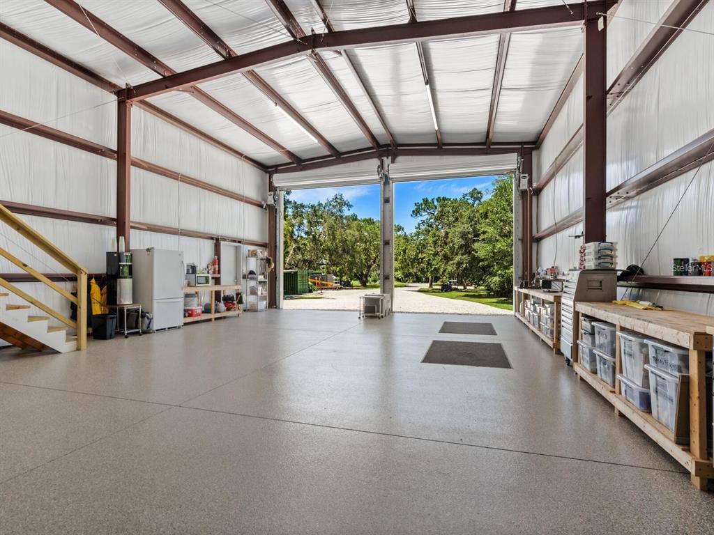 1245 Mill Creek Road Bradenton, FL 34212 - Photo 50 of 56 a view of an entryway with a fountain