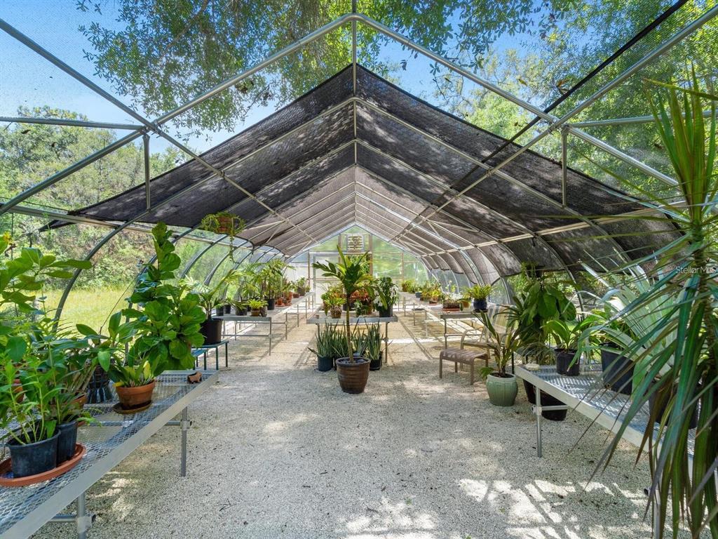 1245 Mill Creek Road Bradenton, FL 34212 - Photo 51 of 56 a view of outdoor space with porch and furniture