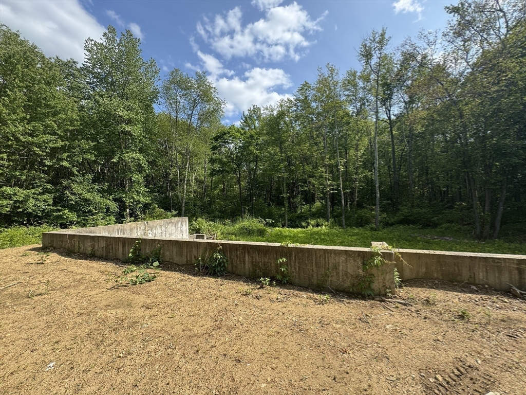 50 Fountain Road Wales, MA 01081 - Photo 11 of 20 a view of backyard with swimming pool and outdoor seating